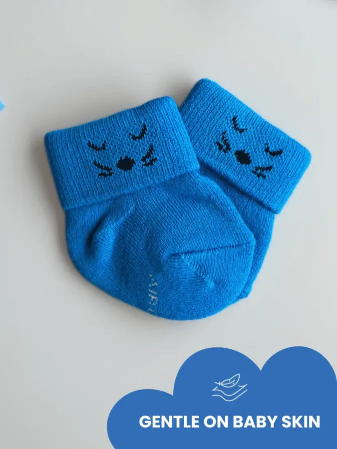  alongside kitten-themed socks in purple